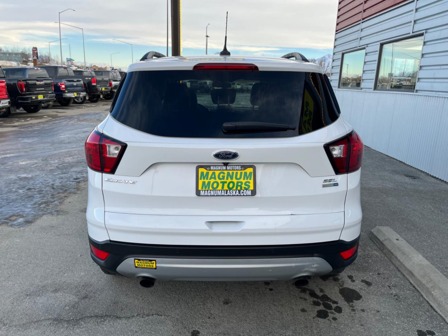 2019 White Ford Escape SEL 4WD (1FMCU9HD0KU) with an 1.5L L4 DOHC 16V engine, 6A transmission, located at 1960 Industrial Drive, Wasilla, 99654, (907) 274-2277, 61.573475, -149.400146 - Photo#4